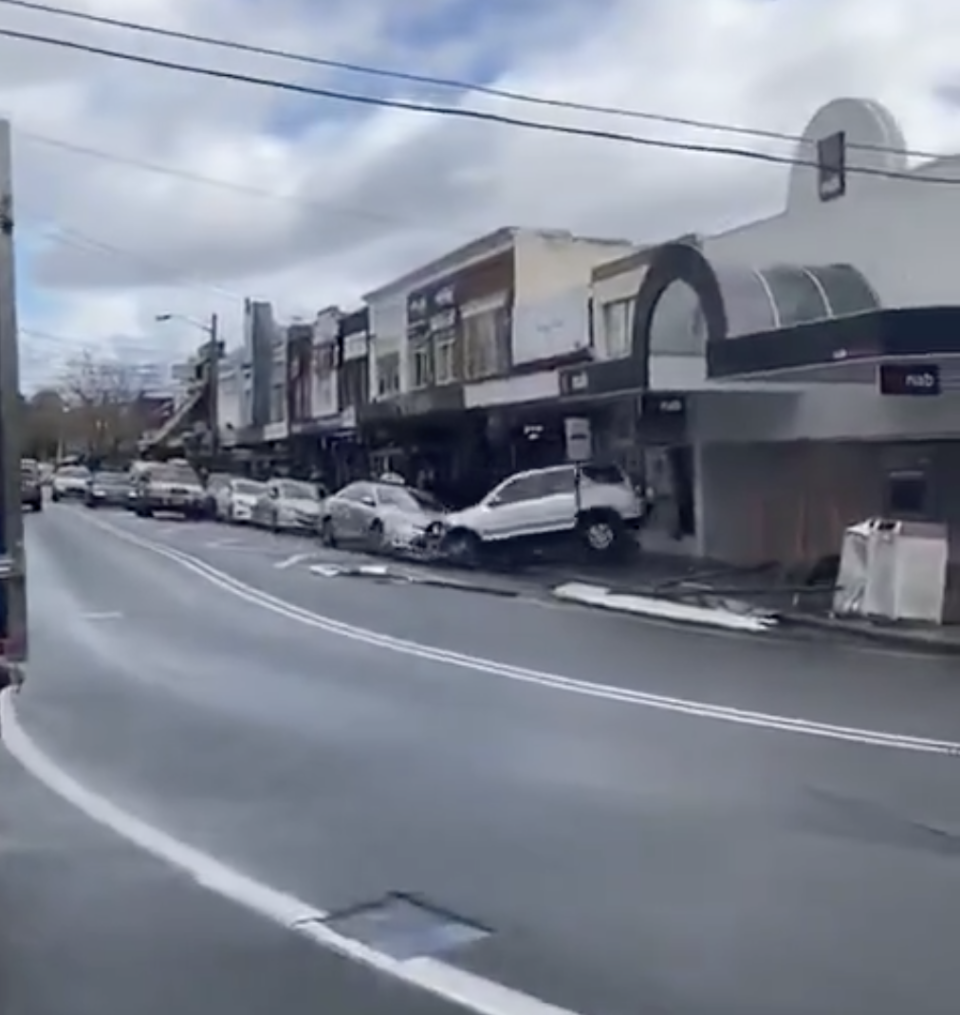 Another video captured the car slamming into the wall before ramming into a yellow bollard. Source: Twitter/amnayang/10 News First