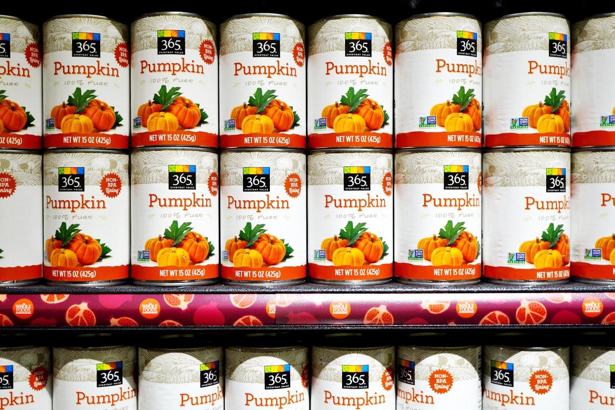 cans of pumpkin puree lined up on the shelf from 365