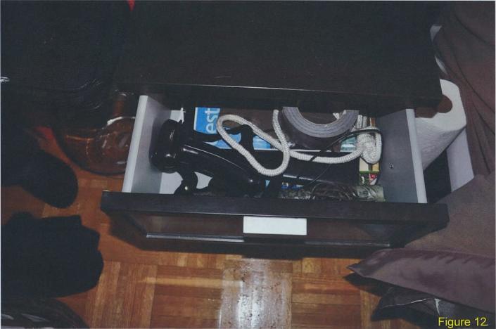 <p>A drawer in McArthur’s apartment containing the tape-wrapped bar, rope and duct tape. The photo was taken when police covertly entered McArthur’s apartment in Dec. 7, 2017. (Photo provided by the Crown) </p>