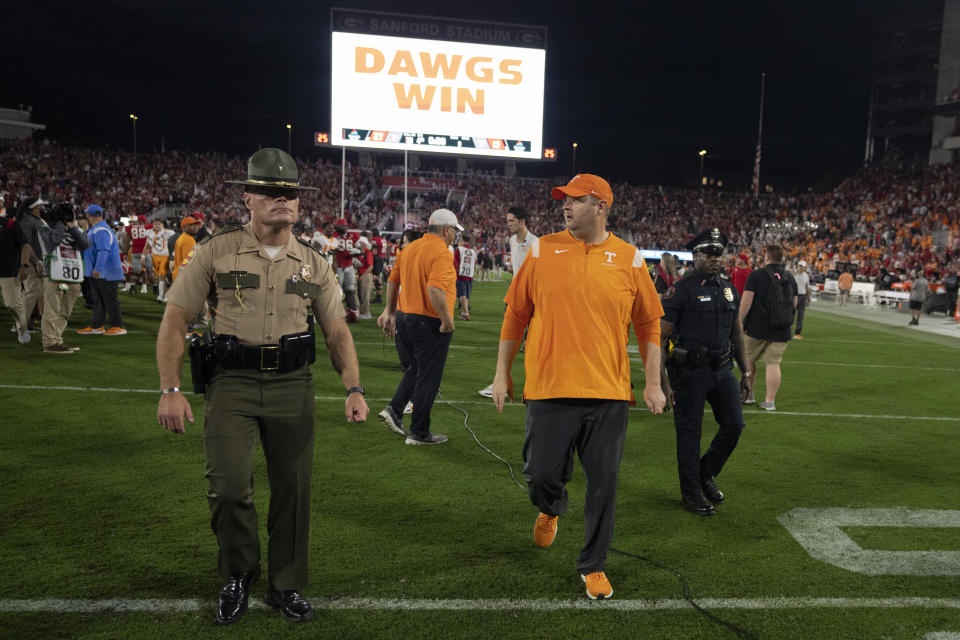 Tennessee head coach Josh Heupel walks off the field after losing to Georgia in an NCAA college football game Saturday, Nov. 5, 2022 in Athens, Ga. (AP Photo/John Bazemore)