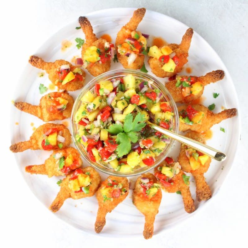 <p>Taste and See</p><p>A delicious and simple appetizer that doesn't look like it only takes 20 minutes to prepare.</p><p><strong>Get the recipe: <a href="https://tasteandsee.com/firecracker-shrimp/" rel="nofollow noopener" target="_blank" data-ylk="slk:Firecracker Shrimp with Pineapple Relish;elm:context_link;itc:0;sec:content-canvas" class="link ">Firecracker Shrimp with Pineapple Relish</a></strong></p>