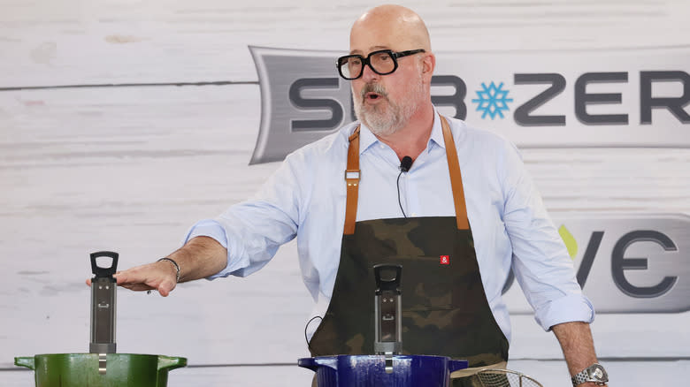 Andrew Zimmern cooking onstage