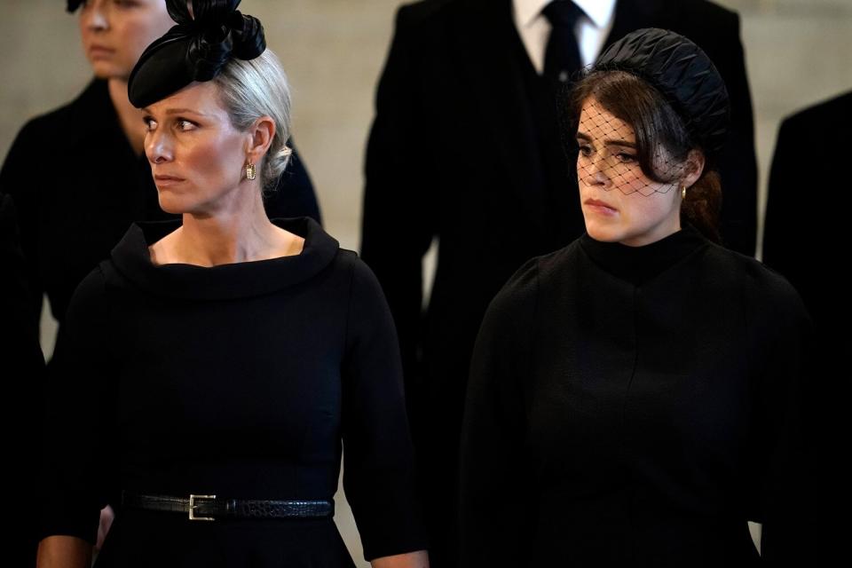 Zara Tindall and Princess Eugenie pay their respects in The Palace of Westminster after the procession for the Lying-in State of Queen Elizabeth II