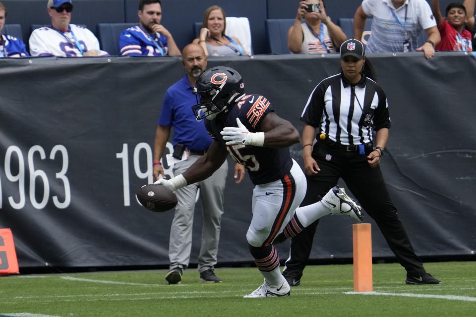 Chicago Bears' Robert Burns goes in for a touchdown during the second half of an NFL preseason football game against the Buffalo Bills, Saturday, Aug. 26, 2023, in Chicago. (AP Photo/Nam Y. Huh)