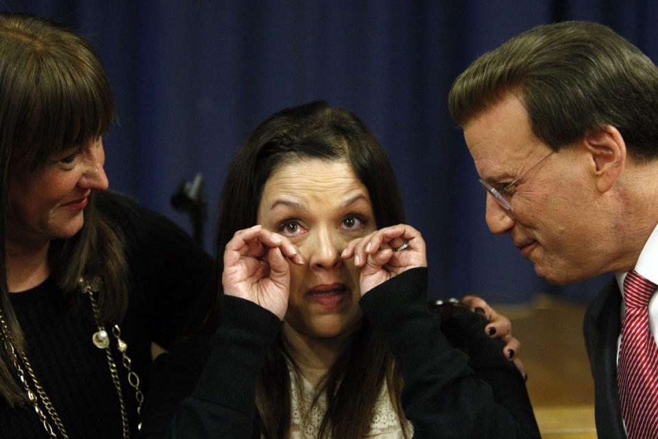 <p>Clover Elementary second grade teacher is overcome by tears after learning she won the $25,ooo Milken Educator Award on January 18, 2013. She was praised for her incredible teaching skills in front of the entire school, including the school's principal Sharon Fabian, pictured left. </p>