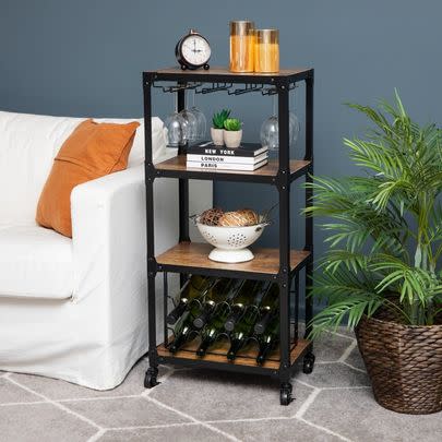 A rolling bar cart with ample storage space