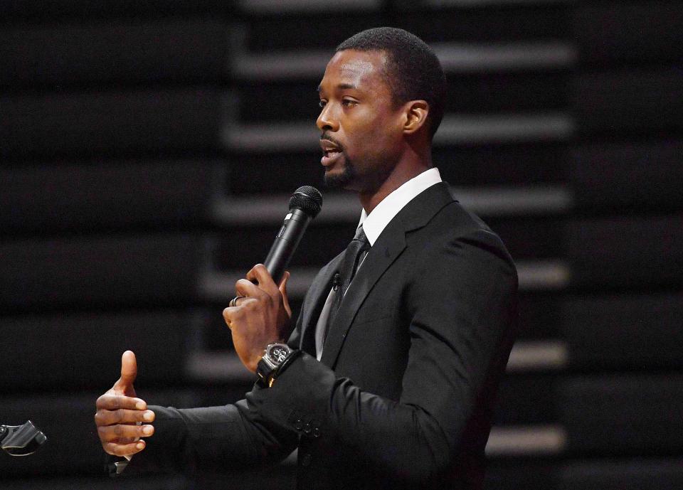 Former Ames High basketball player and current NBA star Harrison Barnes speaks during the dedication ceremony for Ames' new Harrison Barnes Gymnasium and Court on Thursday.