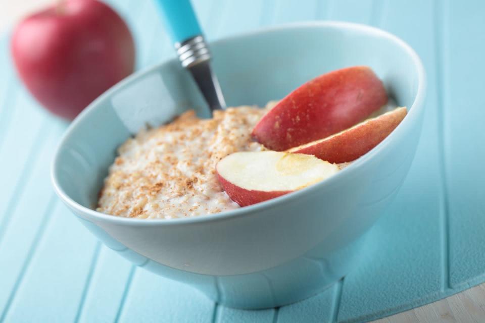 <p>In the microwave, cook 1/2 cup quick-cooking oats with low-fat or unsweetened soy milk. Add 1/2 apple (sliced or chopped), 1 teaspoon honey, and a pinch of <a href="https://www.goodhousekeeping.com/health/diet-nutrition/a47369/health-benefits-of-cinnamon/" rel="nofollow noopener" target="_blank" data-ylk="slk:cinnamon" class="link rapid-noclick-resp">cinnamon</a>.</p><p><strong>RELATED: <a href="https://www.goodhousekeeping.com/health/diet-nutrition/a31028145/oatmeal-benefits/" rel="nofollow noopener" target="_blank" data-ylk="slk:Is Oatmeal Healthy? All the Nutritional Facts and Benefits to Know" class="link rapid-noclick-resp">Is Oatmeal Healthy? All the Nutritional Facts and Benefits to Know</a></strong></p>