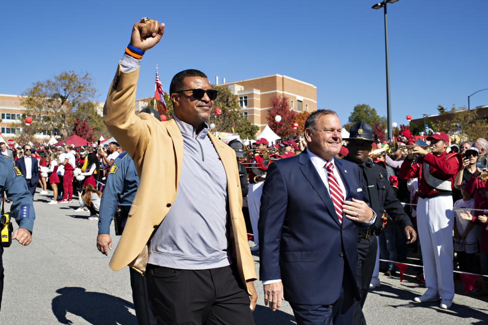 FAYETTEVILLE, ARKANSAS – NOVEMBER 06: Head Coach Sam Pittman of the Arkansas Razorbacks arrives at the stadium with former NFL great and Hall of Famer Steve Atwater before a game against the Mississippi State Bulldogs at Donald W. Reynolds Razorback Stadium on November 06, 2021 in Fayetteville, Arkansas. (Photo by Wesley Hitt/Getty Images)