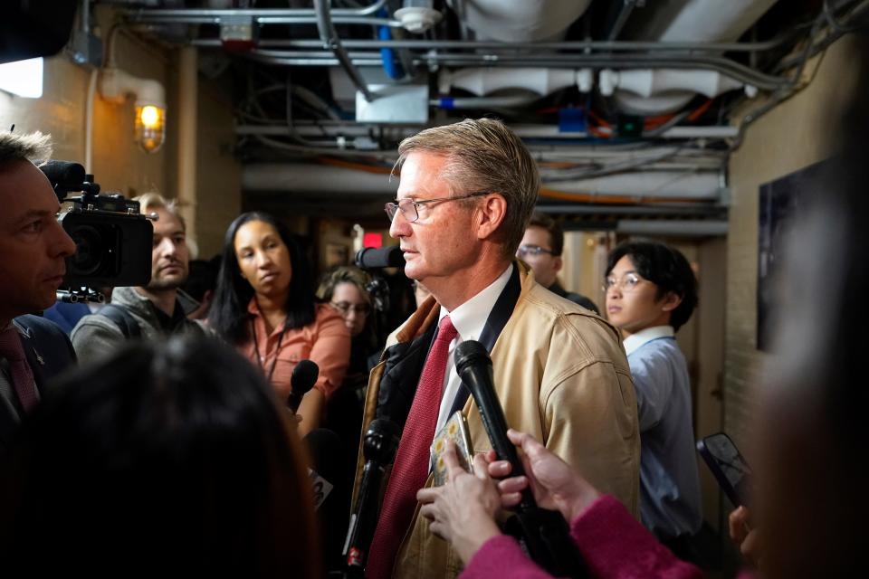 Rep. Tim Burchett, R-Tenn., speaks to reporters as he arrives for the Republican caucus meeting at the Capitol in Washington, Thursday, Oct. 19, 2023. (AP Photo/Alex Brandon)