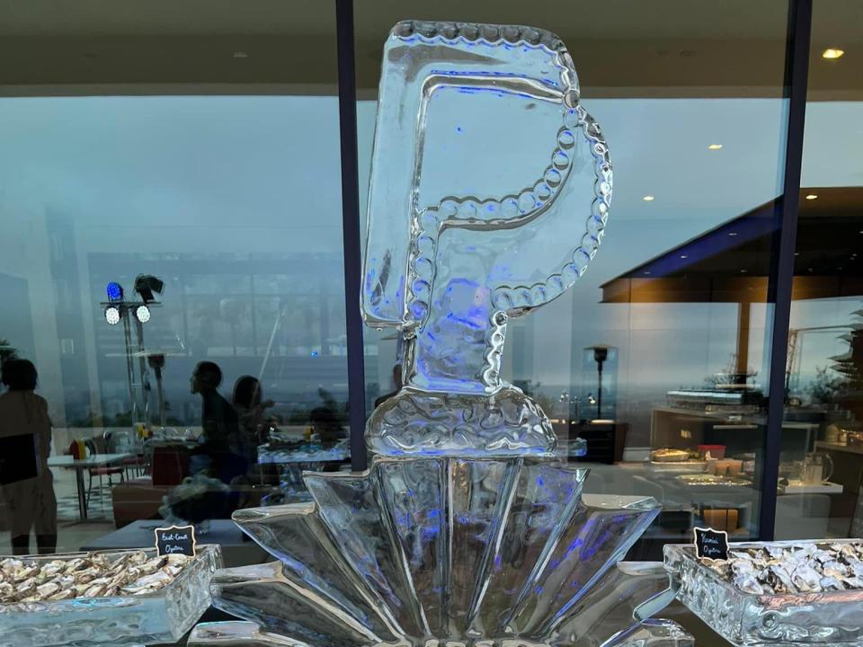The ice sculpture, which had seafood served under it.
