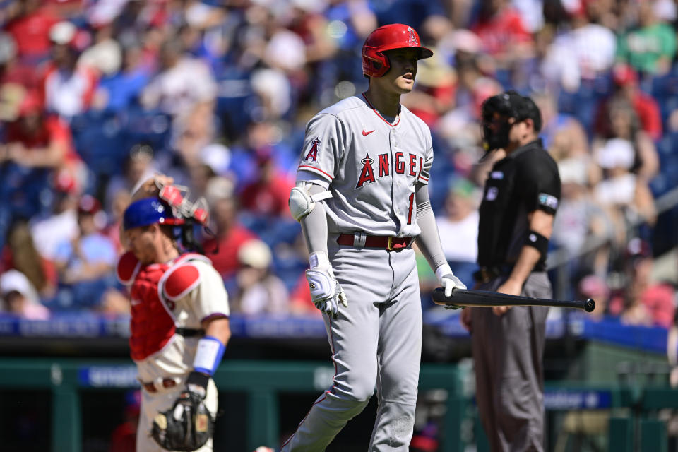 Los Angeles Angels' Shohei Ohtani walks back to the dugout after striking out against Philadelphia Phillies' Nick Nelson during the fifth inning of a baseball game, Sunday, June 5, 2022, in Philadelphia. (AP Photo/Derik Hamilton)