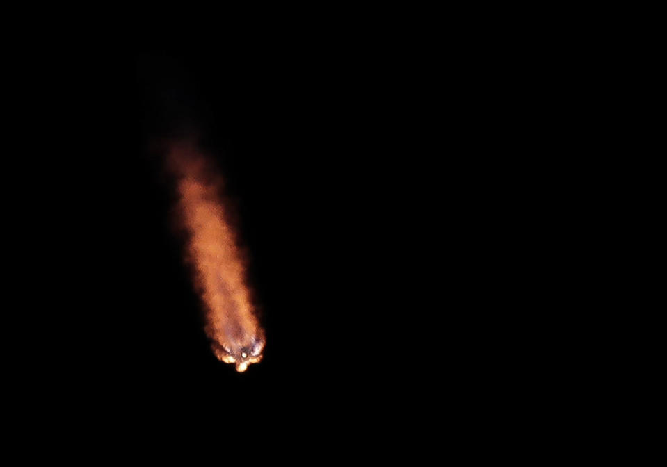 A Falcon 9 SpaceX rocket, with a payload of 60 satellites for SpaceX's Starlink broadband network, lifts off from Space Launch Complex 40 at Florida's Cape Canaveral Air Force Station, Thursday, May 23, 2019. (AP Photo/John Raoux)