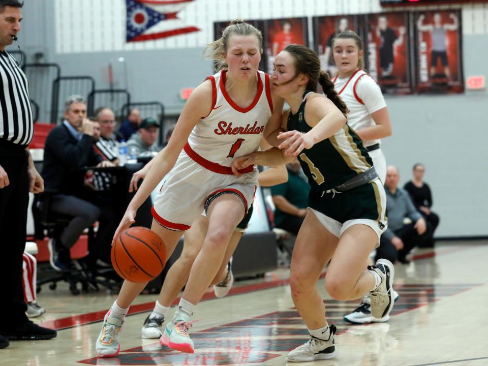 Jamisyn Stinson, of Sheridan, drives the baseline during a 73-49 win against Athens during a Division II district semifinal on Feb. 20 at Piketon High School. Stinson, now a senior, recently signed with North Florida and joined her sister, Faith Stinson, as a Division I signee.