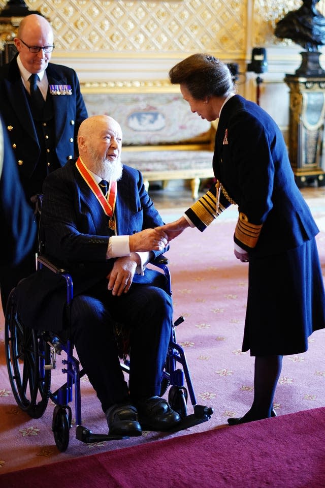 Sir Michael Eavis being honoured by the Princess Royal