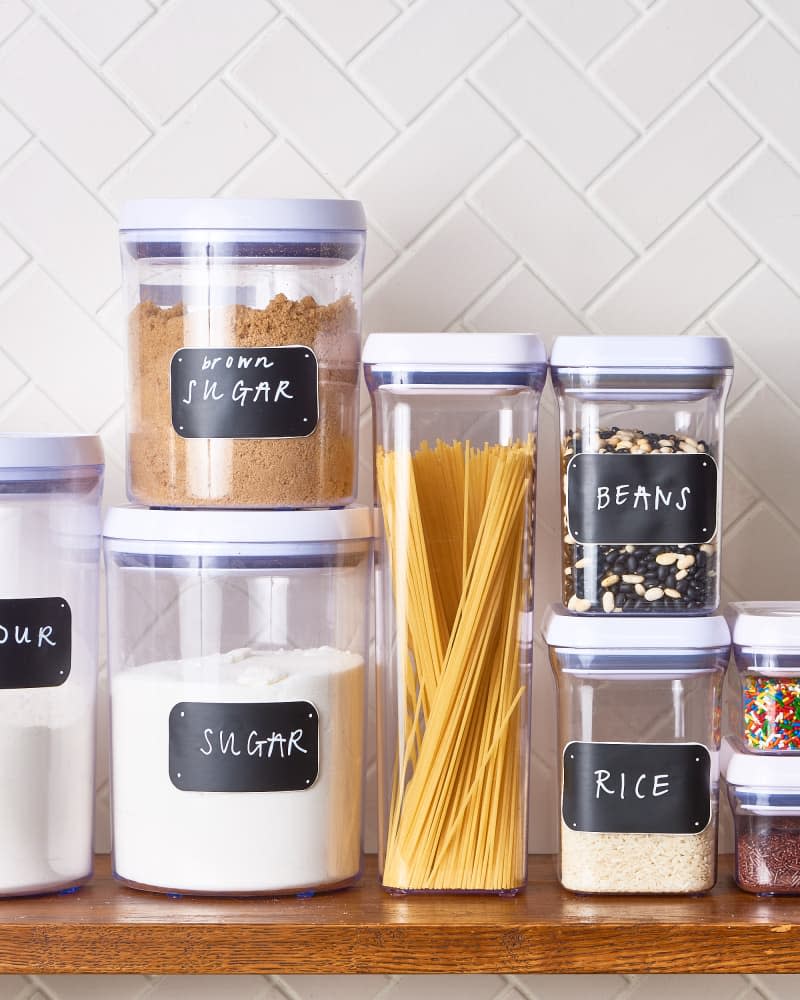 Sugar, pasta, and grains are kept in uniform containers