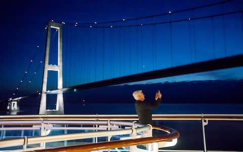 Phillip taking a photo of Oresund Bridge