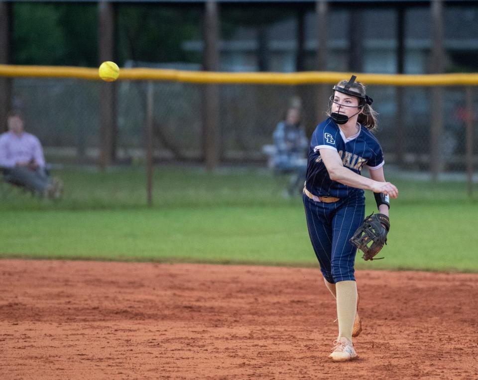 Shortstop Kaylee King (7) throws to first for an out during the Gulf Breeze vs Navarre softball game at Navarre High School on Tuesday, April 26, 2022.