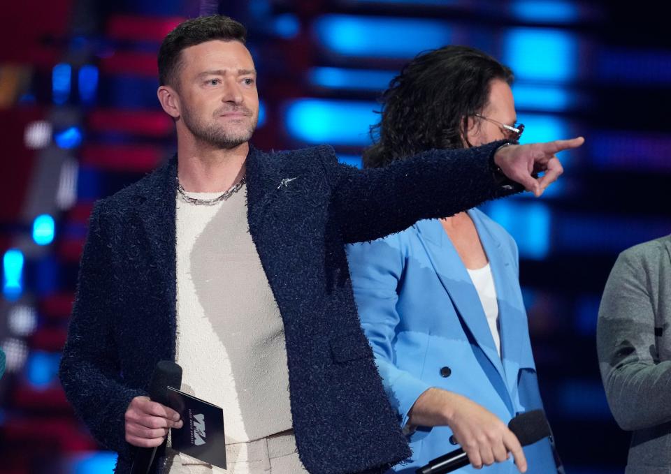 Justin Timberlake of NSYNC presents the award on Sept. 12, 2023 for best pop during the MTV Video Music Awards at the Prudential Center in Newark, N.J. The pop performer announced that he will perform in another free concert, this one Jan. 31, in New York City.