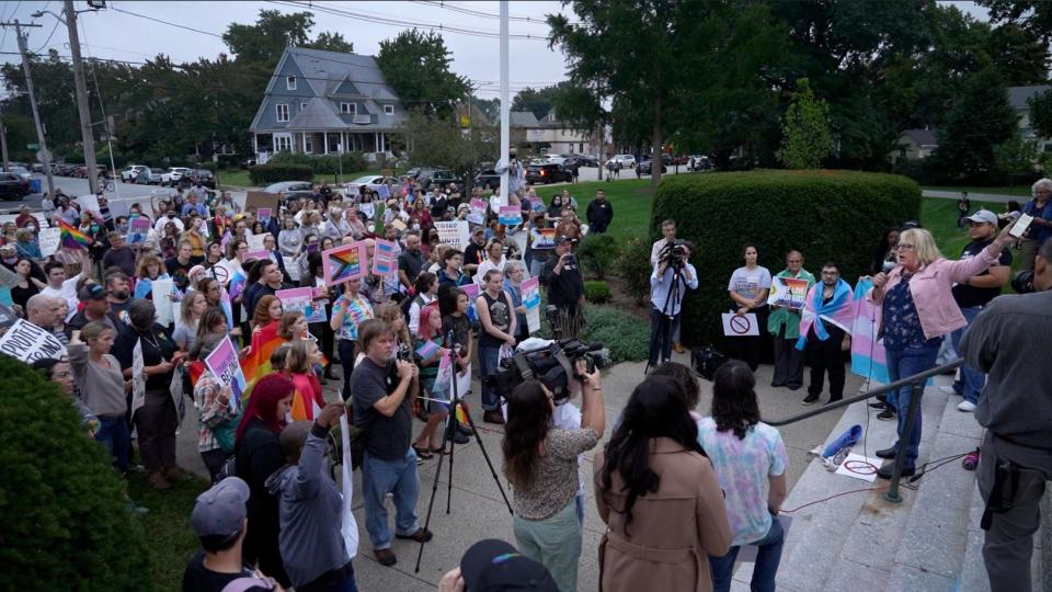 The Rev. Donnie Anderson, a transgender woman, addresses protesters at the steps of the William Hall Free Library in Cranston on Monday evening.