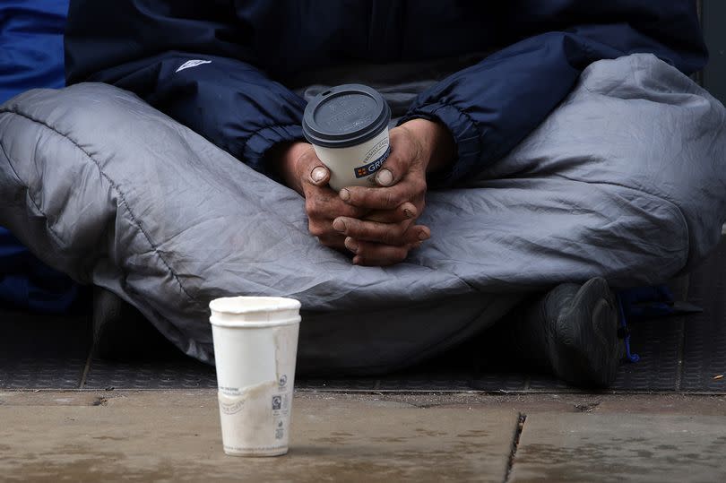 Rough sleepers and people begging stake out pitches in doorways across Manchester city centre -Credit:Sean Hansford | Manchester Evening News