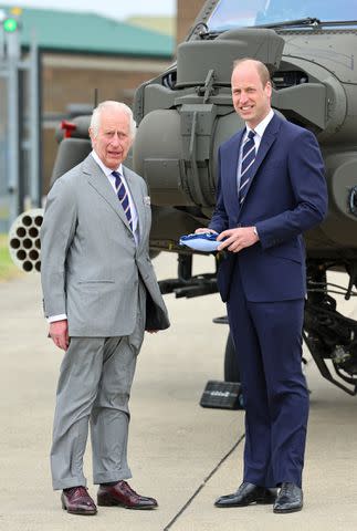 <p>Chris Jackson/Getty Images</p> King Charles and Prince Williams at the Colonel-in-Chief handover in Hampshire on May 13