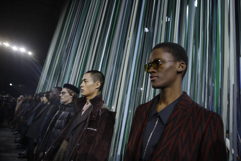 Models wear creations as part of the Ermenegildo Zegna men's Fall-Winter 2020/21 collection, that was presented in Milan, Italy, Friday, Jan. 10, 2019. (AP Photo/Luca Bruno)