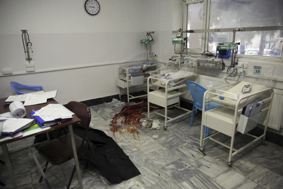 Blood stains the floor of a maternity hospital after gunmen attacked, in Kabul, Afghanistan, Tuesday, May 12, 2020. Gunmen stormed the hospital in the western part of Kabul on Tuesday, setting off a shootout with the police and killing several people. (AP Photo/Rahmat Gul)