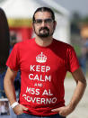 A 5-Star movement supporter wears a t-shirt reading " Keep calm and 5-Star to lead the government" during a gathering in Rimini, Italy, September 23, 2017. REUTERS/Max Rossi