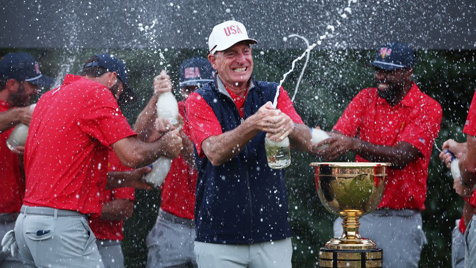 Furyk toasts American triumph. - Jared C. Tilton/Getty Images