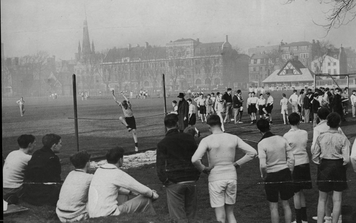 Pupils Playing Sports At Westminster School Playing Fields In the 1930s - Anthony Wallace/Shutterstock