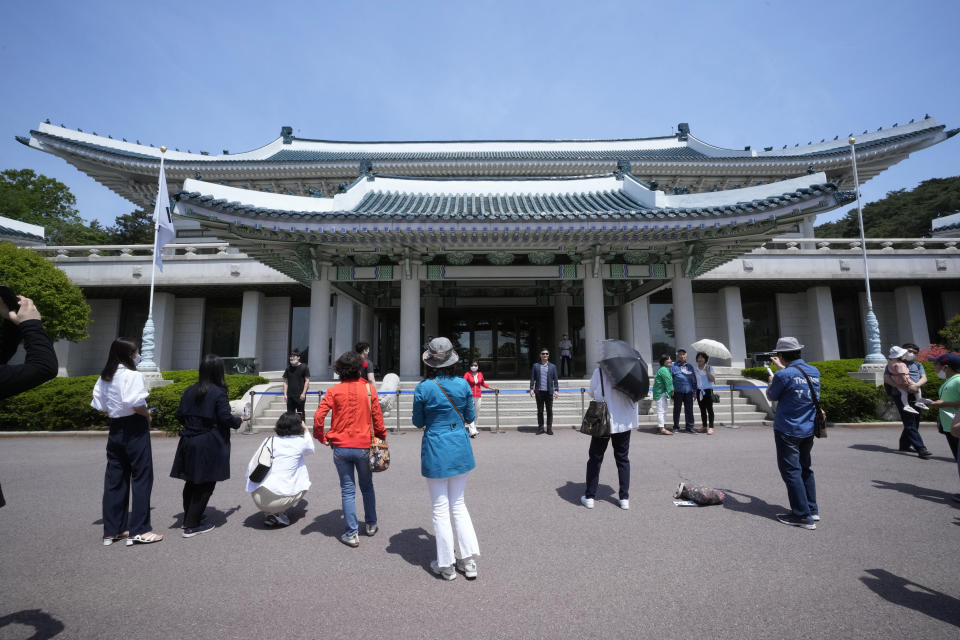 People visit the Blue House, the former presidential palace, in Seoul, South Korea, Thursday, May 12, 2022. For most South Koreans, the former presidential palace in Seoul was as shrouded in mystery as the buildings in their secretive rival North Korea. That’s now changed recently as thousands have been allowed a look inside for the first time in 74 years. (AP Photo/Ahn Young-joon)