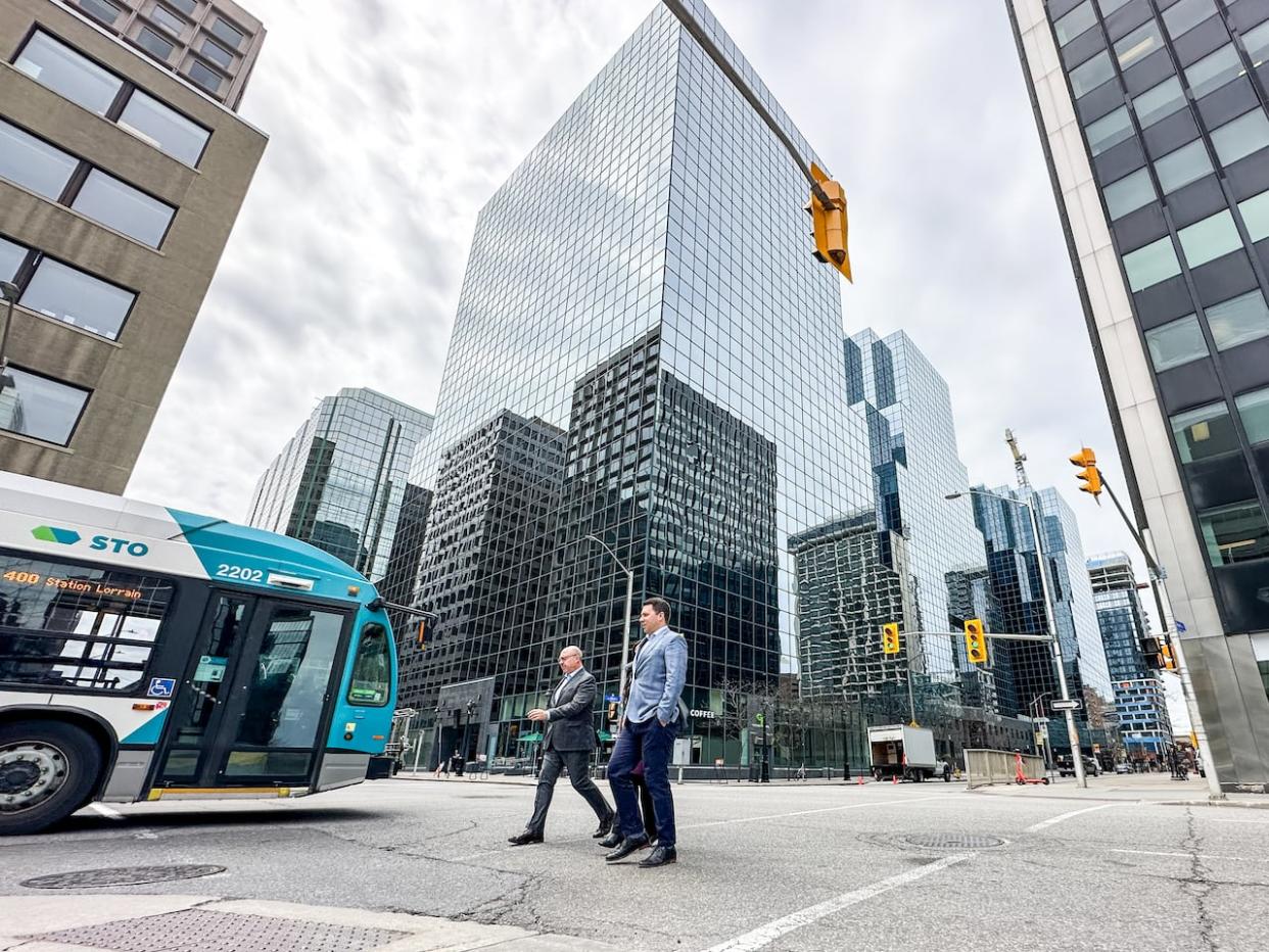 Federal government employees could be heading back to the office three days a week by September, a federal government source confirmed to Radio-Canada. (Stu Mills/CBC - image credit)