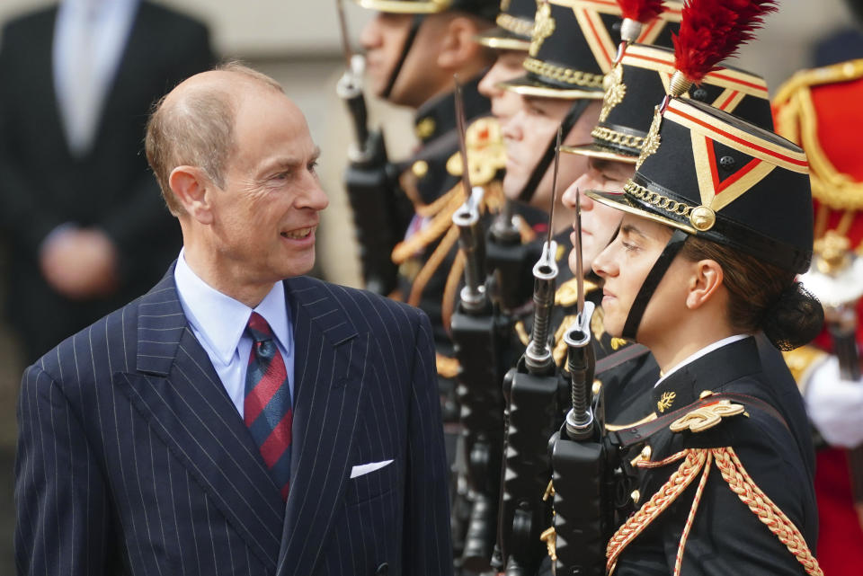 Britain's Prince Edward, the Duke of Edinburgh attends as troops from France's 1er Regiment de le Garde Republicaine partake in the Changing of the Guard ceremony at Buckingham Palace, to commemorate the 120th anniversary of the Entente Cordiale - the historic diplomatic agreement between Britain and France which laid the groundwork for their collaboration in both world wars, in London, Monday, April 8, 2024. France is the first non-Commonwealth country to take part in the Changing of the Guard. (Victoria Jones/Pool Photo via AP)