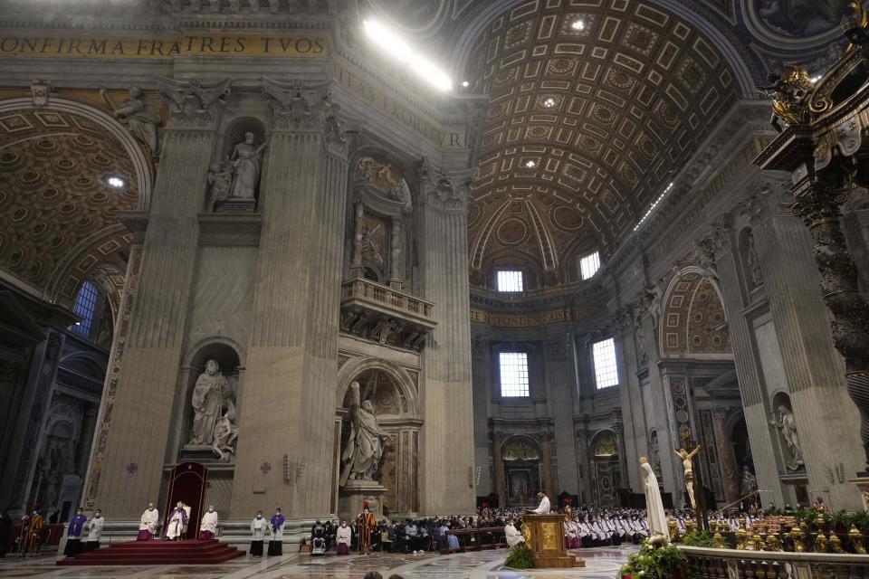 Pope Francis presides over a special prayer in St. Peter's Basilica at the Vatican, Friday, March 25, 2022. Francis is presiding over a special prayer for Ukraine that harks back to a century-old apocalyptic prophesy about peace and Russia that was sparked by purported visions of the Virgin Mary to three peasant children in Fatima, Portugal in 1917. (AP Photo/Gregorio Borgia)