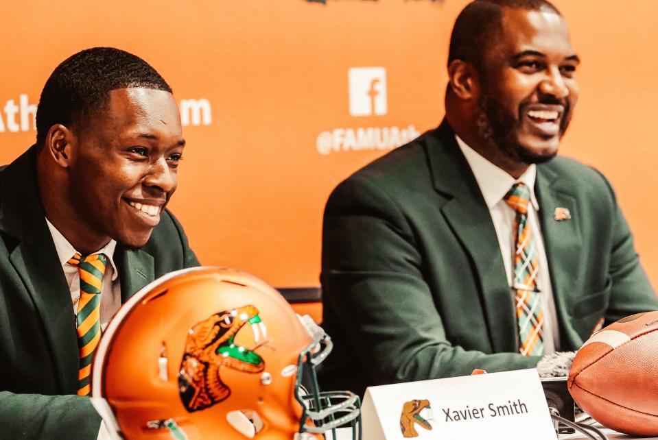 Rattlers wide receiver Xavier Smith (left) and head coach Willie Simmons share a laugh during FAMU Media Day at the Hyatt House on Tuesday, Aug. 3, 2021.