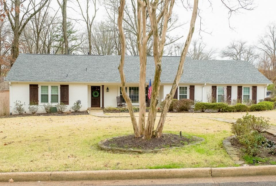 The two-story, painted brick house, c. 1966 has approximately 3,200 square-feet of living space.