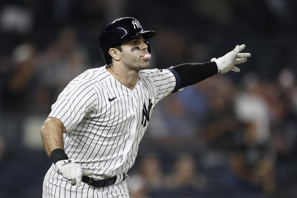 New York Yankees' Ryan LaMarre watches his walk-off single against the Philadelphia Phillies during the 10th inning of a baseball game Wednesday, July 21, 2021, in New York. The Yankees won 6-5. (AP Photo/Adam Hunger)