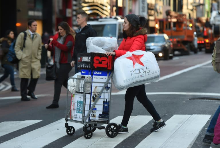 A New York shopper takes advantage of the 2017 Black Friday sales, which kicked off the day after Thanksgiving