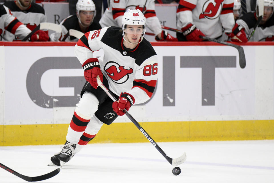 FILE - New Jersey Devils center Jack Hughes (86) in action during the second period of an NHL hockey game against the Washington Capitals, Saturday, March 26, 2022, in Washington. Coming into the 2022-2023 season, the Devils have missed the playoffs the last four years. (AP Photo/Nick Wass, File)