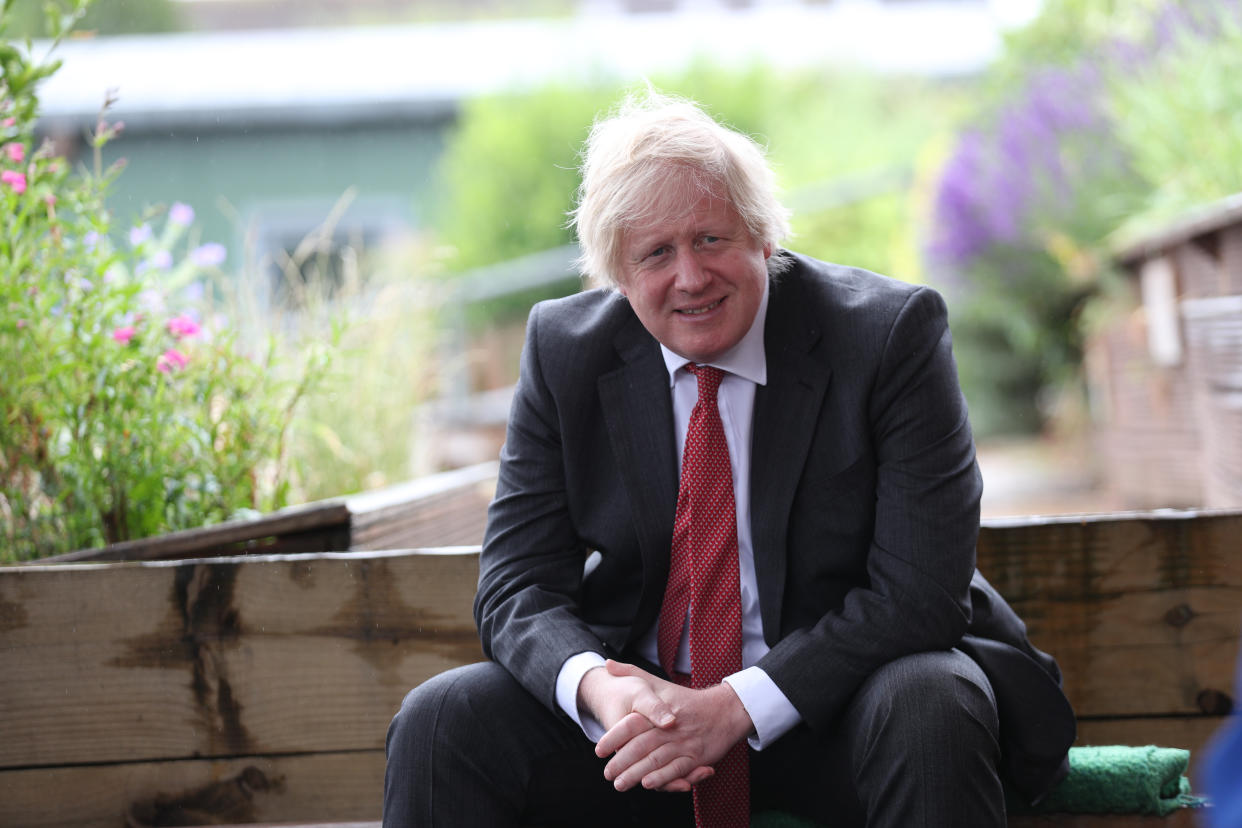 Prime Minister Boris Johnson joins a socially distanced lesson during a visit to Bovingdon Primary School in Bovingdon, Hemel Hempstead, Hertfordshire, following the announcement of a GBP 1 billion plan to help pupils catch up with their education before September after spending months out of school during the coronavirus lockdown.