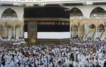 Thousands of Muslim pilgrims circumambulate around the Kaaba, the cubic building at the Grand Mosque, in the Saudi Arabia's holy city of Mecca, Tuesday, July 5, 2022. Saudi Arabia is expected to receive one million Muslims to attend Hajj pilgrimage, which will begin on July 7, after two years of limiting the numbers because coronavirus pandemic. (AP Photo/Amr Nabil)