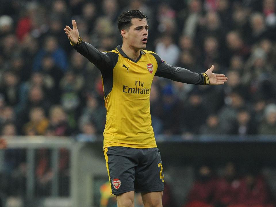 Wenger pulled Granti Xhaka aside during the game in an effort to stop the capitulation (Getty)