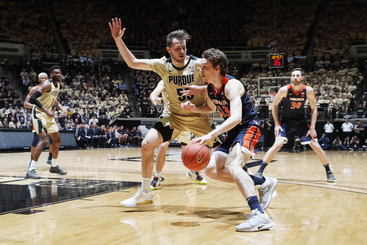 A Virginia roster that lost its top talent from last year's NCAA championship team struggled to score against Purdue. (Brian Spurlock/USA Today)