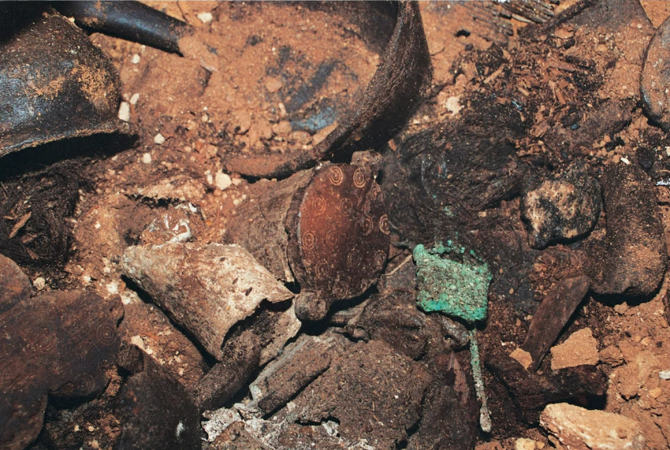 The buried hoard which included a container with the human hair used in the study.