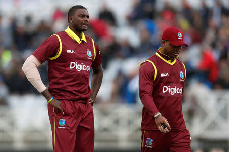 Cricket - England vs West Indies - Second One Day International - Trent Bridge, Nottingham, Britain - September 21, 2017 West Indies' Jason Holder and Marlon Samuels Action Images via Reuters/Andrew Boyers