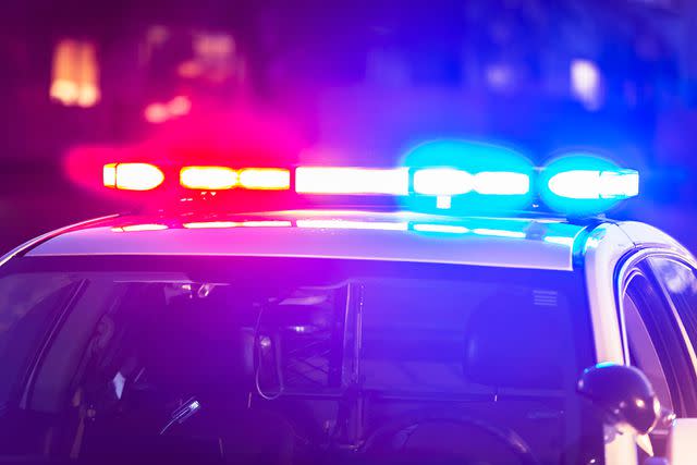 <p>Getty</p> Flashing lights on top of police patrol car -- stock image