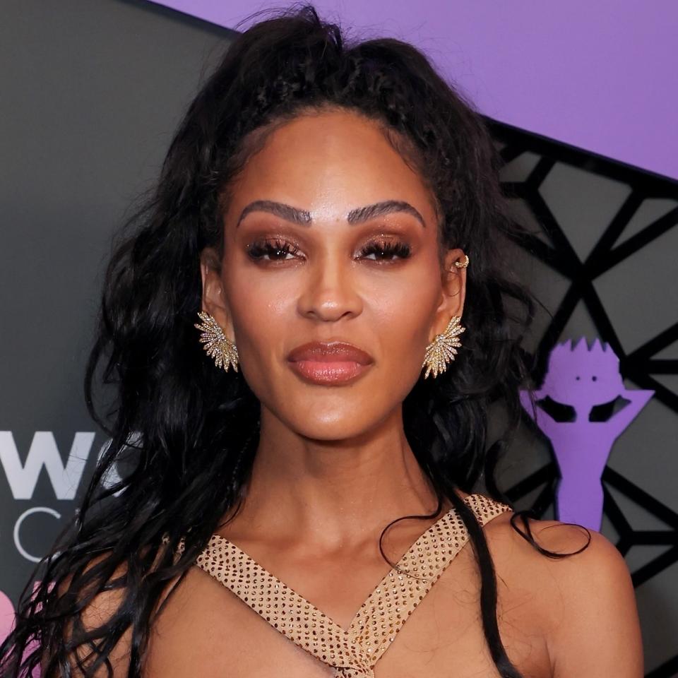 Meagan Good in a stylish, cut-out dress at a red carpet event