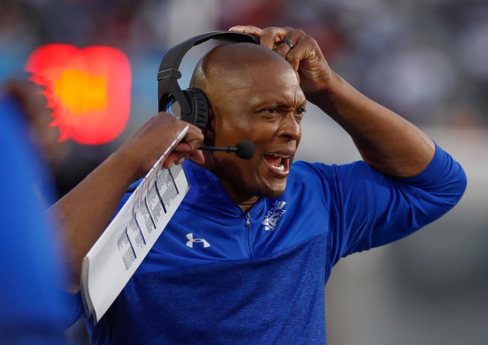 Sep 11, 2021; Memphis, TN, USA; TSU head coach Eddie George yells over his microphone in the Southern Heritage Classic between Tennessee State University and Jackson State University at Liberty Bowl Memorial Stadium in Memphis, Tenn., on Saturday, Sept. 11, 2021.  Mandatory Credit: Henry Taylor-USA TODAY Sports