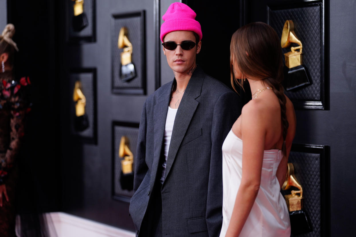 LAS VEGAS - APRIL 3: Justin Bieber and Hailey Bieber arrive at THE 64TH ANNUAL GRAMMY AWARDS, broadcasting live Sunday, April 3 (8:00-11:30 PM, LIVE ET/5:00-8:30 PM, LIVE PT) on the CBS Television Network, and available to stream live and on demand on Paramount+*. (Photo by Eric Jamison/CBS via Getty Images)